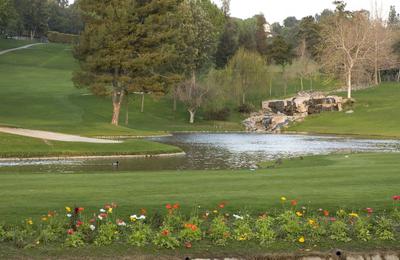 1st Tee and Looking back up The 18th Fairway over That Famous Pond